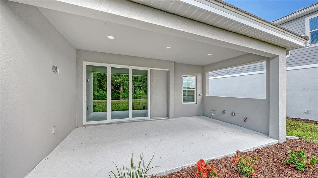 Exterior details and patio area of a home in Grand Park, Sarasota (Image 3).