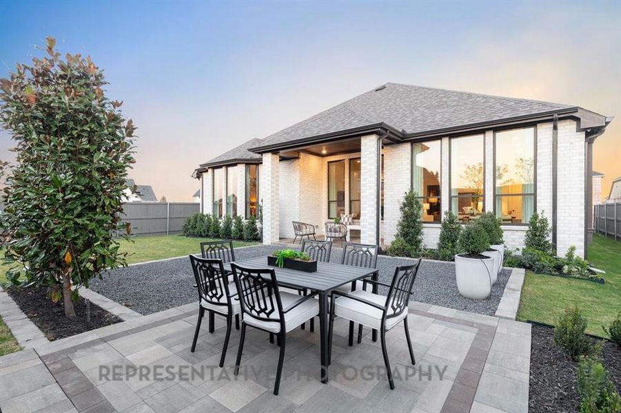 Exterior details and patio area of a home in Wildflower Ranch, Dish (Image 19).