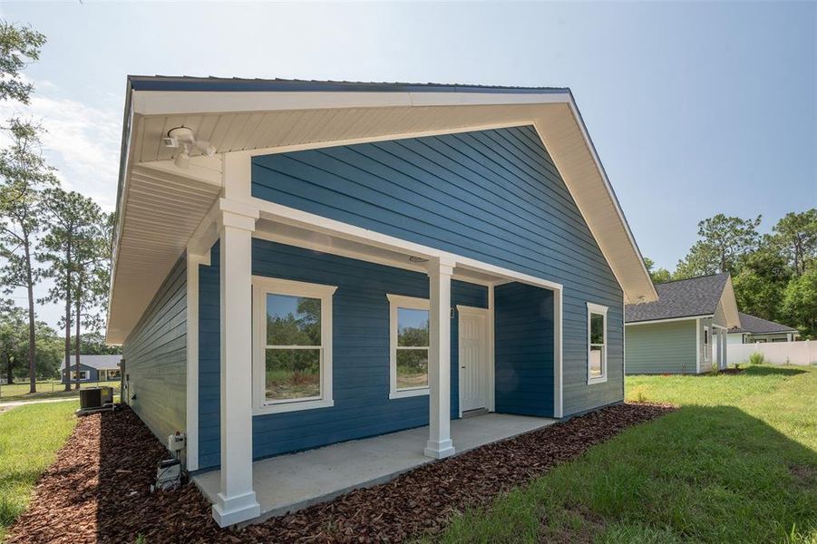 Exterior details and patio area of a home in , Williston (Image 2).