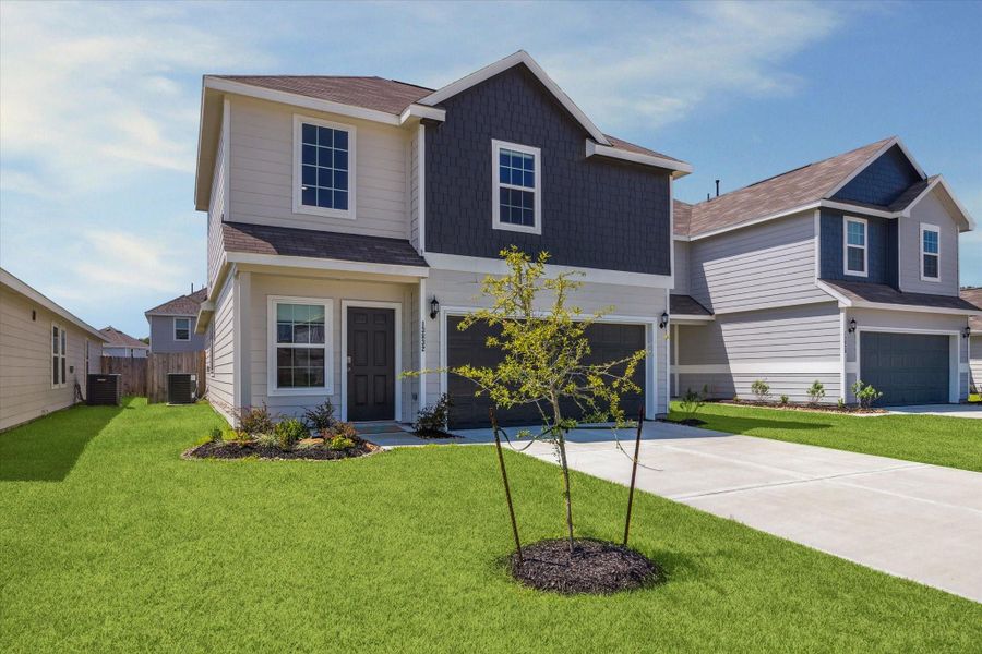 Front exterior of a new home in Townsend Reserve, Splendora, TX, highlighting curb appeal (Image 18).