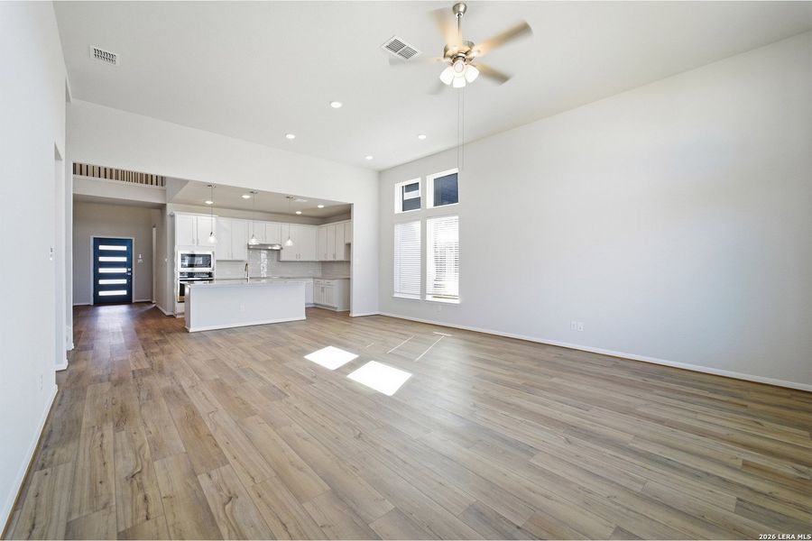 Spacious, unfurnished interior of a new home in The Woodlands at Medina Hills, Mico (Image 26).