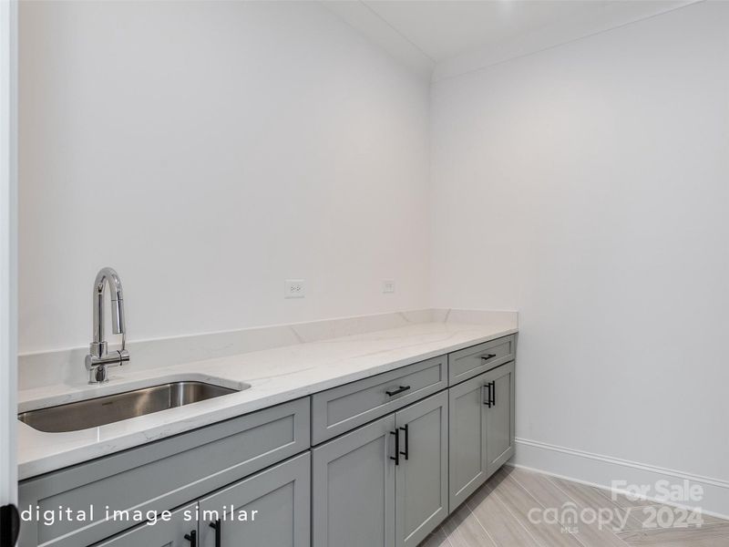 Similar upstairs laundry room from a different build project