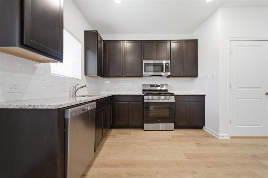 Furnished interior view inside a new home in Westridge, McKinney (Image 6).
