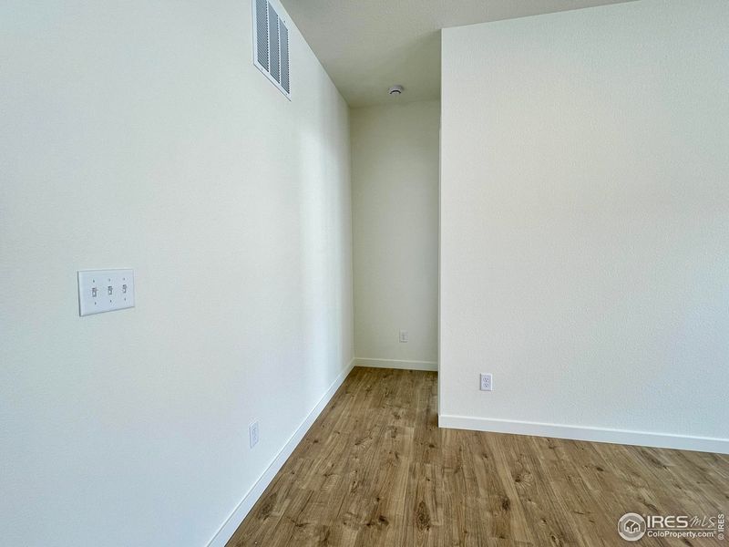 Spacious, unfurnished interior of a new home in Union Colony West, Greeley (Image 20).