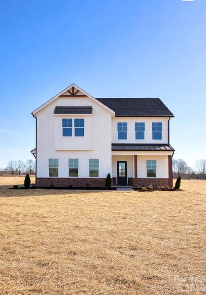 Exterior details and patio area of a home in , Mocksville (Image 16).