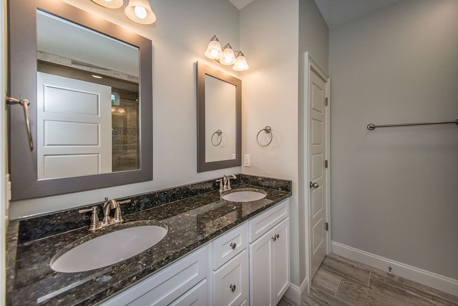 Representative furnished interior of a home built from the Mediterranean by Enchanted Homes in Lonesome Dove, San Antonio (Image 15).