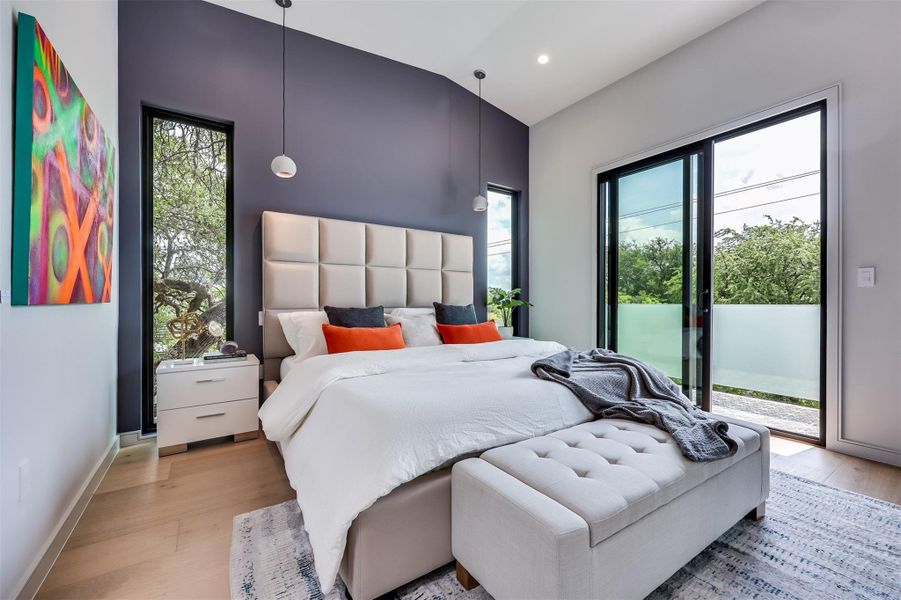 Large windows ensure you wake up with the sun, while the engineered hardwoods keep the space feeling warm and grounded