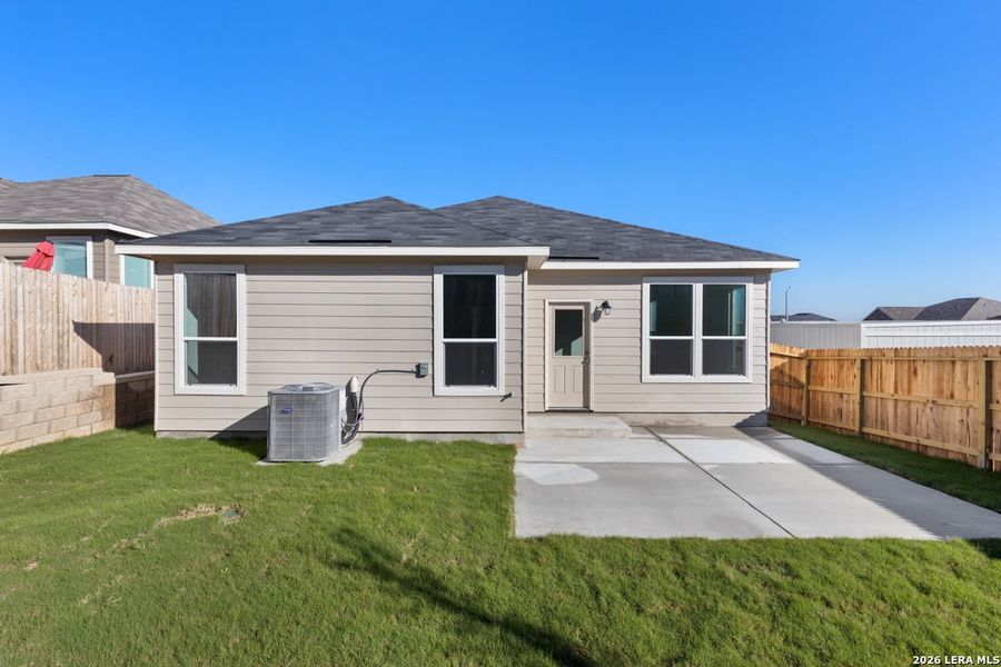 Exterior details and patio area of a home in Knox Ridge, Converse (Image 4).
