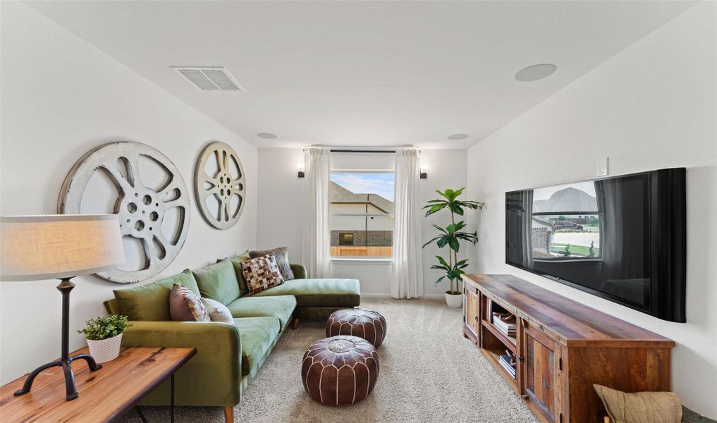 Dedicated media room (*Photo not of actual home and used for illustration purposes only.) Dedicated media room (*Photo not of actual home and used for illustration purposes only.)