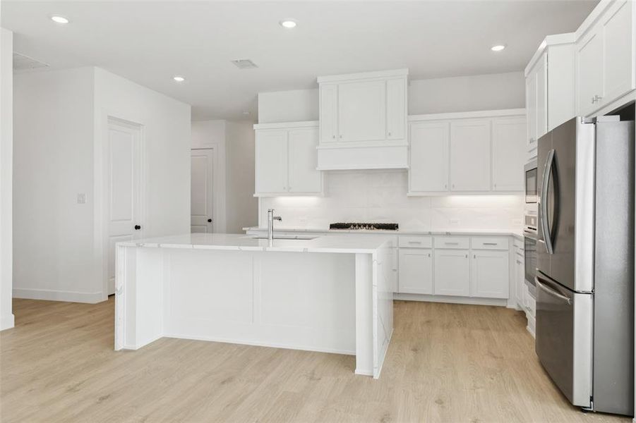 No shortage of space or style in this chef's dream kitchen. No shortage of space or style in this chef's dream kitchen.
