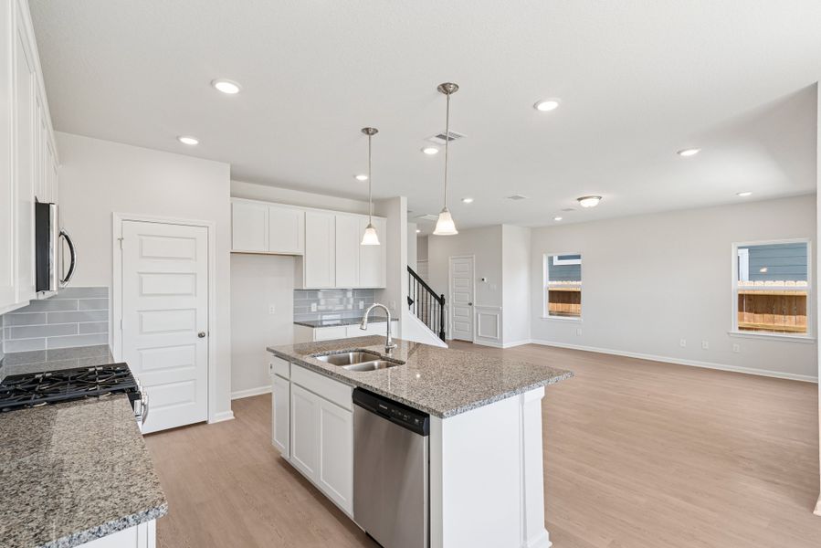 The Oriole II- Kitchen into Family Room The Oriole II- Kitchen into Family Room