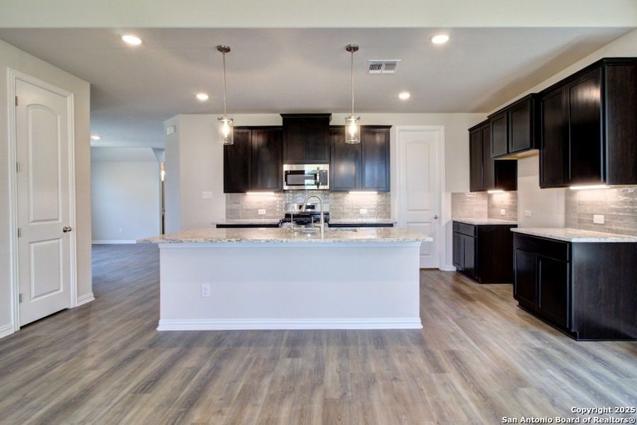 Furnished interior view inside a new home in , New Braunfels (Image 7).