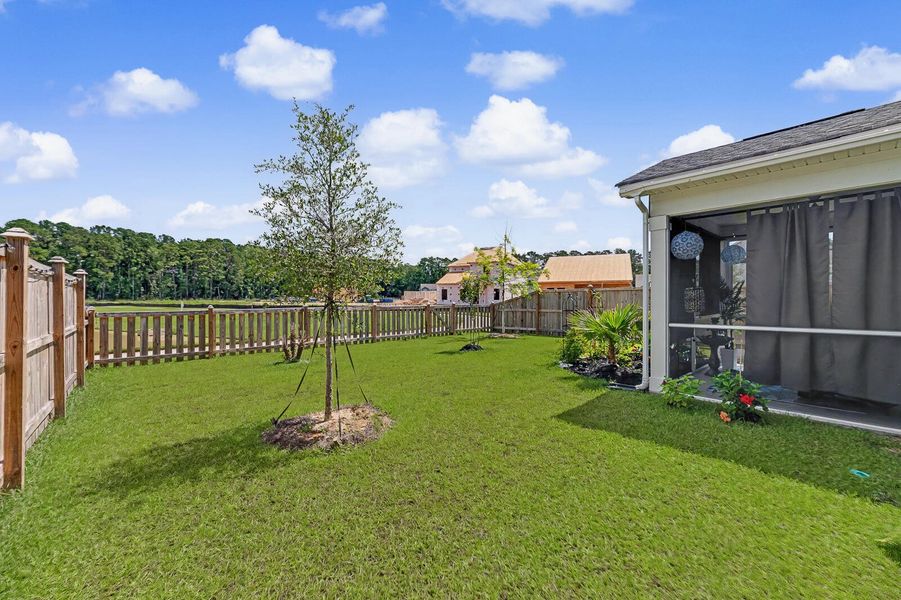 Exterior details and patio area of a home in Six Oaks, Summerville (Image 25).