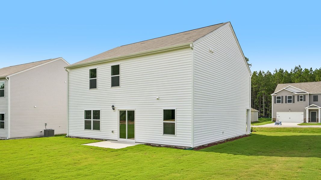 Exterior details and patio area of a home in Mangum Farms, Stem (Image 3).