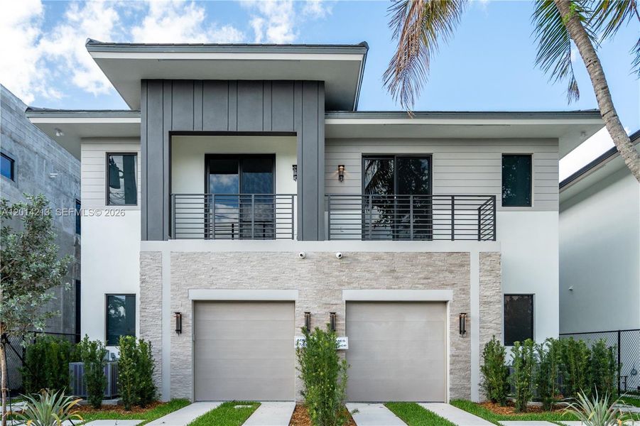 Front exterior of a new home in , Miami, FL, highlighting curb appeal (Image 2). Front exterior of a new home in , Miami, FL, highlighting curb appeal (Image 2).