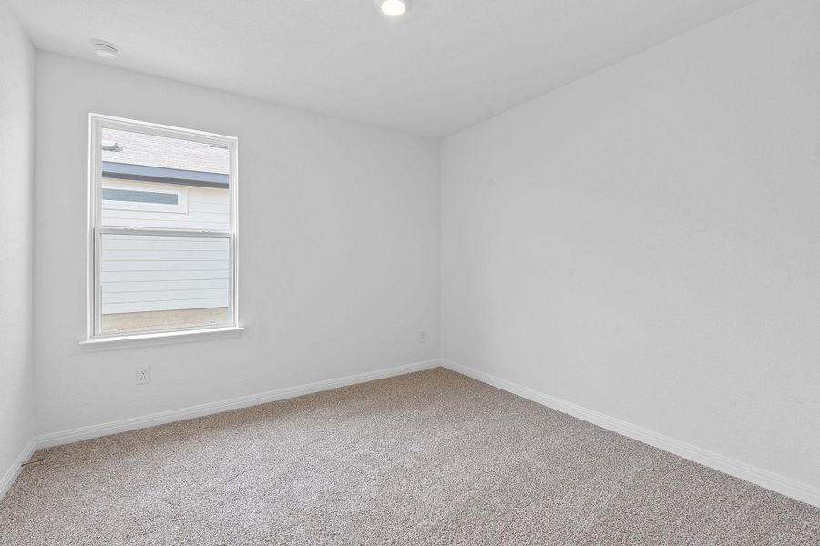 Spare room with carpet flooring and recessed lighting Spare room with carpet flooring and recessed lighting