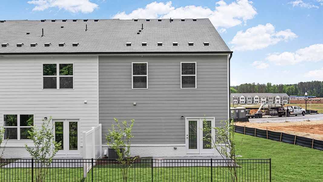 Exterior details and patio area of a home in Echo Glen, Stockbridge (Image 2).