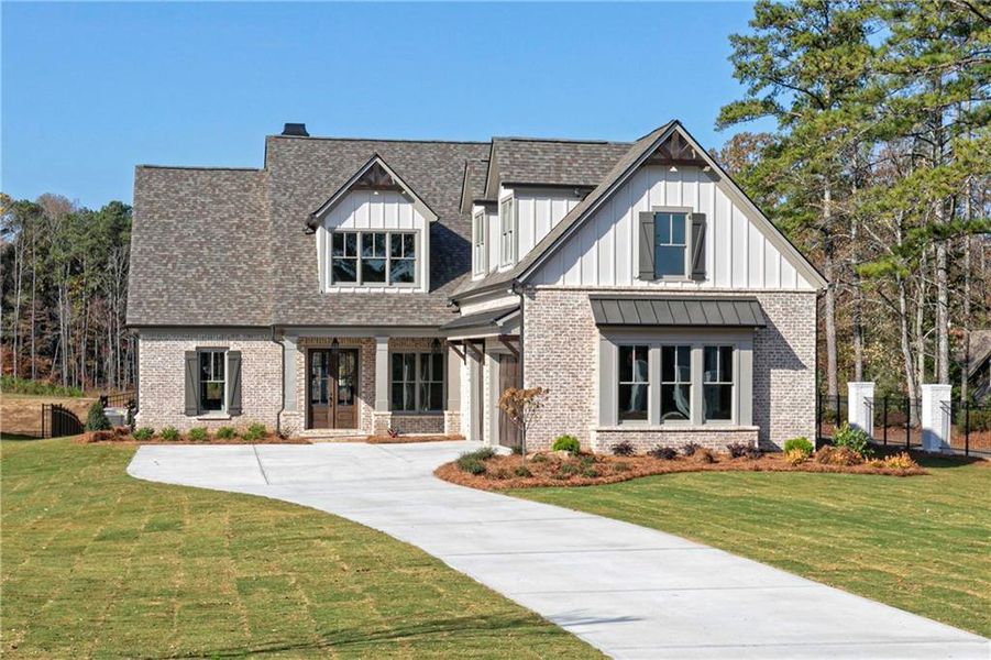 Front exterior of a new home in Woodford, Acworth, GA, highlighting curb appeal (Image 1).