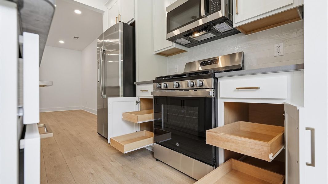 Luxury-inspired kitchen featuring expansive storage space and elegant design elements located at Marion Square Luxury-inspired kitchen featuring expansive storage space and elegant design elements located at Marion Square
