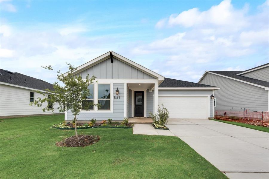 Front exterior of a new home in Creekside of Crowley, Crowley, TX, highlighting curb appeal (Image 2).