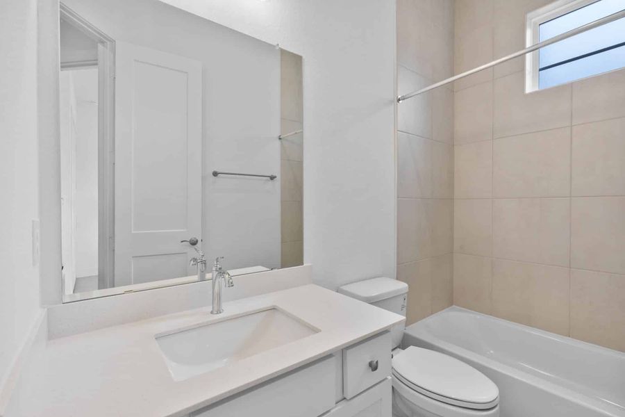 Furnished interior view inside a new home in Attwater 55s, Waller (Image 9).