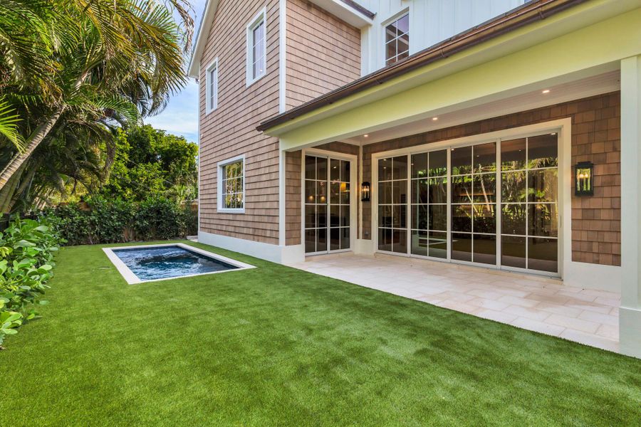 Exterior details and patio area of a home in , West Palm Beach (Image 3).