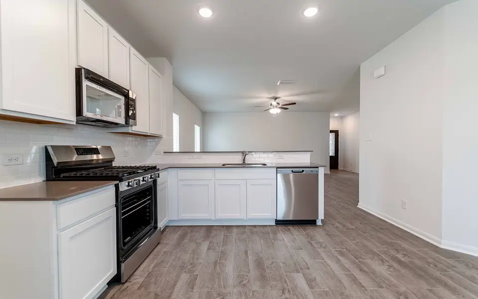 Furnished interior view inside a new home in Hickory Ridge, Elmendorf (Image 5).