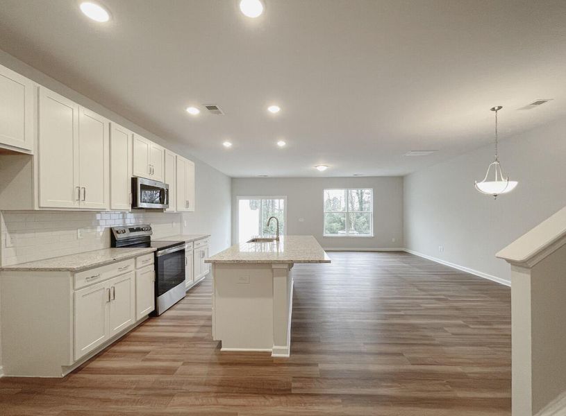 Furnished interior view inside a new home in East Main Townes, Spartanburg (Image 6).