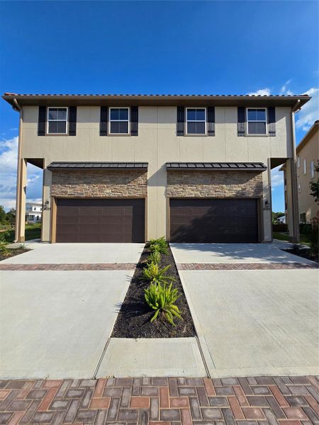 Front exterior of a new home in , Seabrook, TX, highlighting curb appeal (Image 2). Front exterior of a new home in , Seabrook, TX, highlighting curb appeal (Image 2).