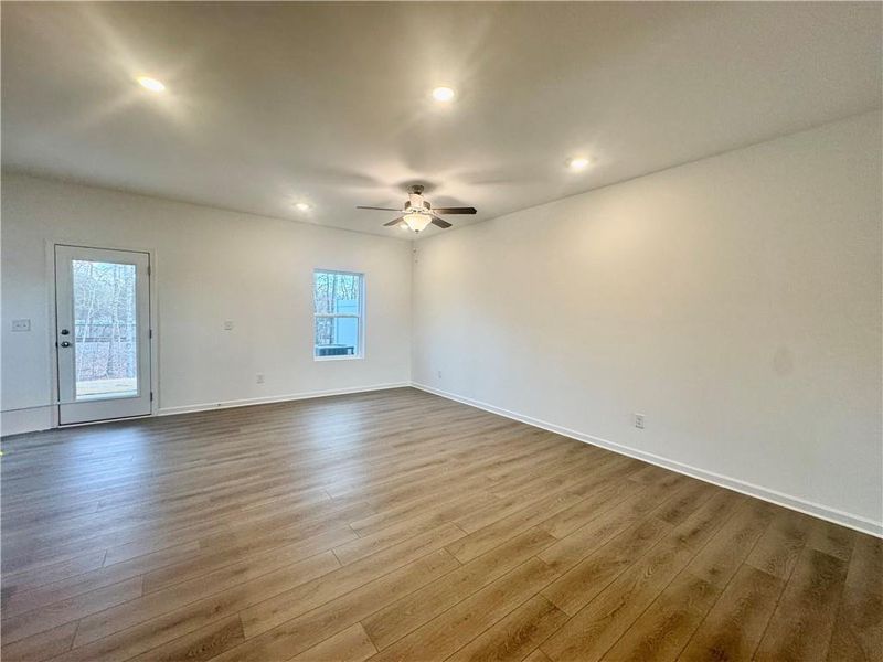 Spacious, unfurnished interior of a new home in Eastlyn Crossing, Flowery Branch (Image 13).