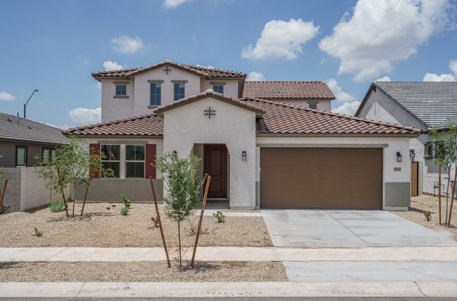 Representative exterior photo of a completed home built from the Willow by William Ryan Homes in The Grove at El Cidro, Goodyear, AZ (Image 24). Representative exterior photo of a completed home built from the Willow by William Ryan Homes in The Grove at El Cidro, Goodyear, AZ (Image 24).