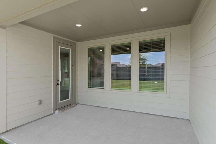 Exterior details and patio area of a home in Painted Tree, McKinney (Image 19).