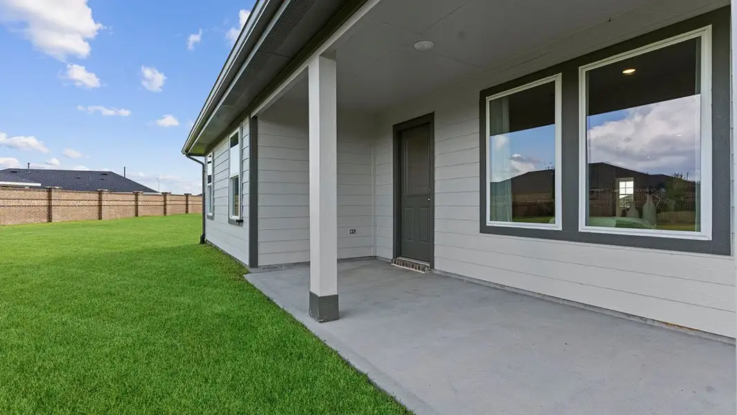 Exterior details and patio area of a home in Tamarron, Fulshear (Image 2). Exterior details and patio area of a home in Tamarron, Fulshear (Image 2).