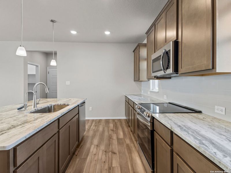 Furnished interior view inside a new home in Hannah Heights, Seguin (Image 9).