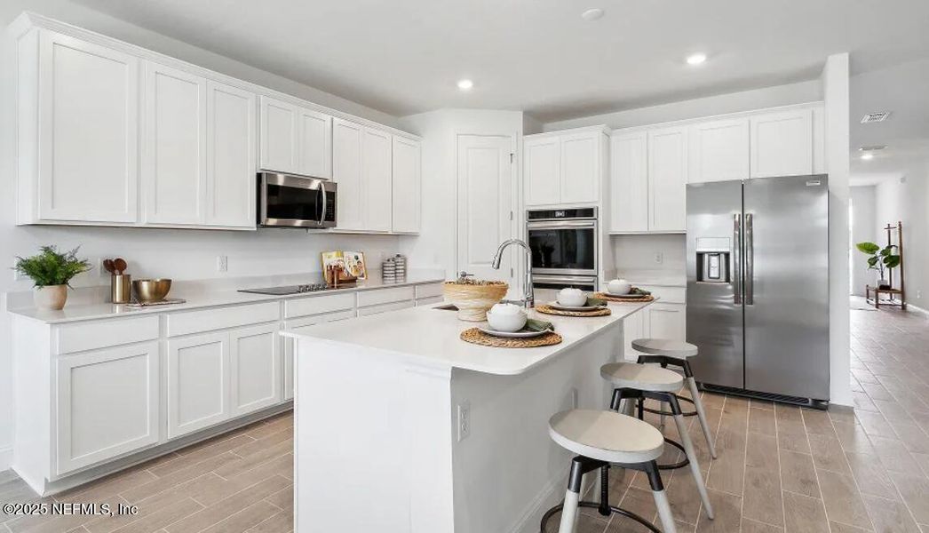 Furnished interior view inside a new home in Edenbrooke at Hyland Trail | 55+, Green Cove Springs (Image 11). Furnished interior view inside a new home in Edenbrooke at Hyland Trail | 55+, Green Cove Springs (Image 11).