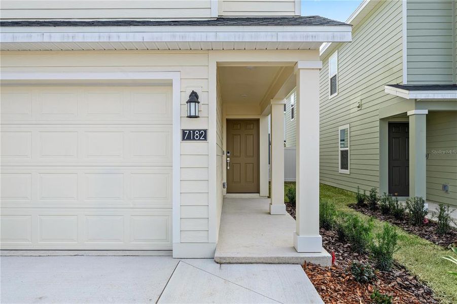 Exterior details and patio area of a home in Pioneer Ranch, Ocala (Image 3).