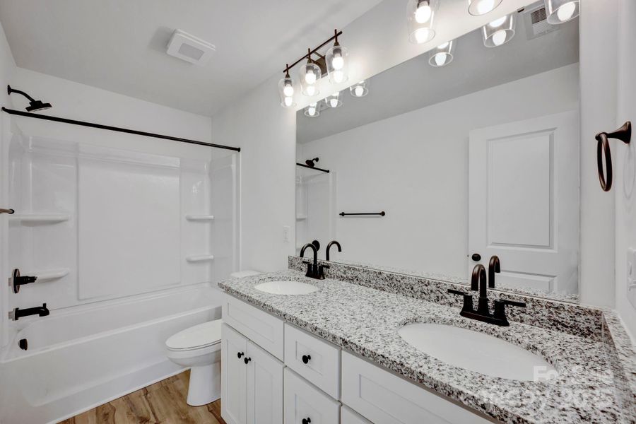 Furnished interior view inside a new home in , Concord (Image 10).