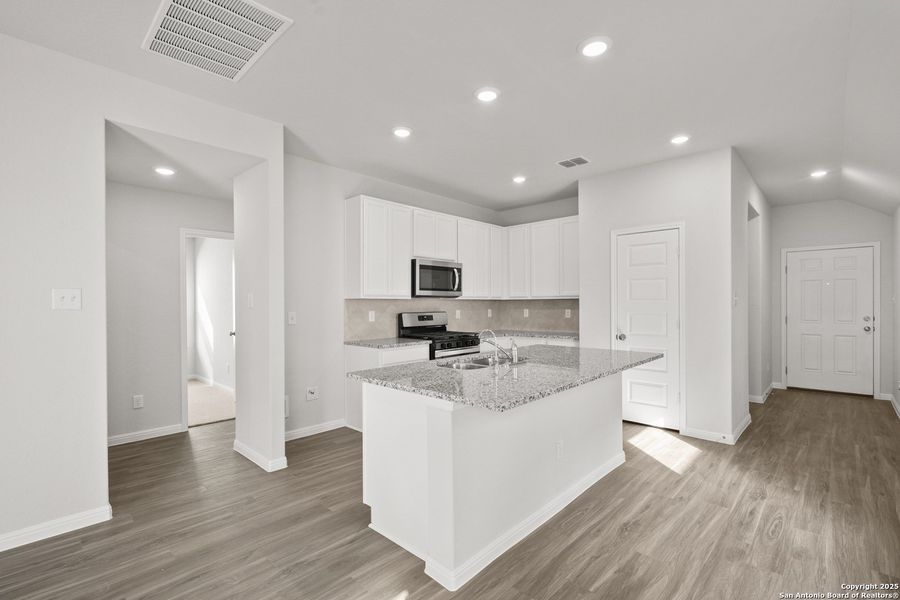 Furnished interior view inside a new home in Timber Creek, San Antonio (Image 6). Furnished interior view inside a new home in Timber Creek, San Antonio (Image 6).