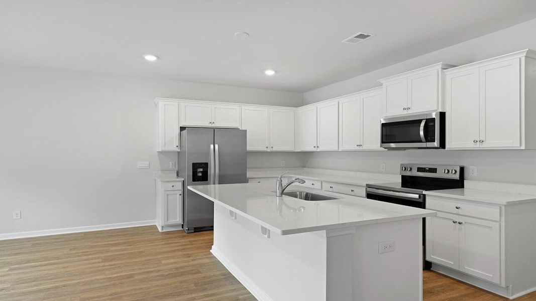 Furnished interior view inside a new home in Garbon Fields, Summerville (Image 11).