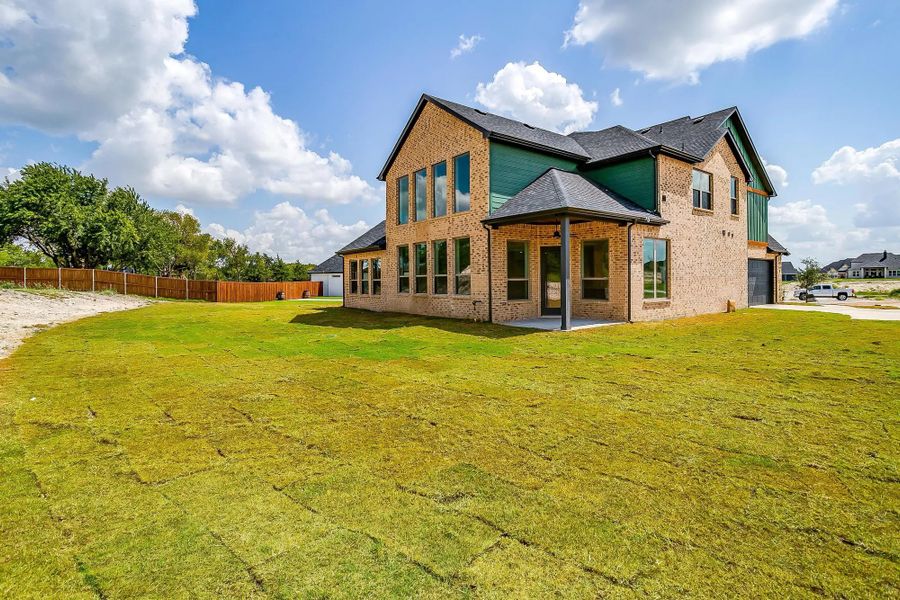 Representative exterior photo of a completed home built from the The Landry by Elmwood Custom Homes in Matthews Farm, Venus, TX (Image 1). Representative exterior photo of a completed home built from the The Landry by Elmwood Custom Homes in Matthews Farm, Venus, TX (Image 1).