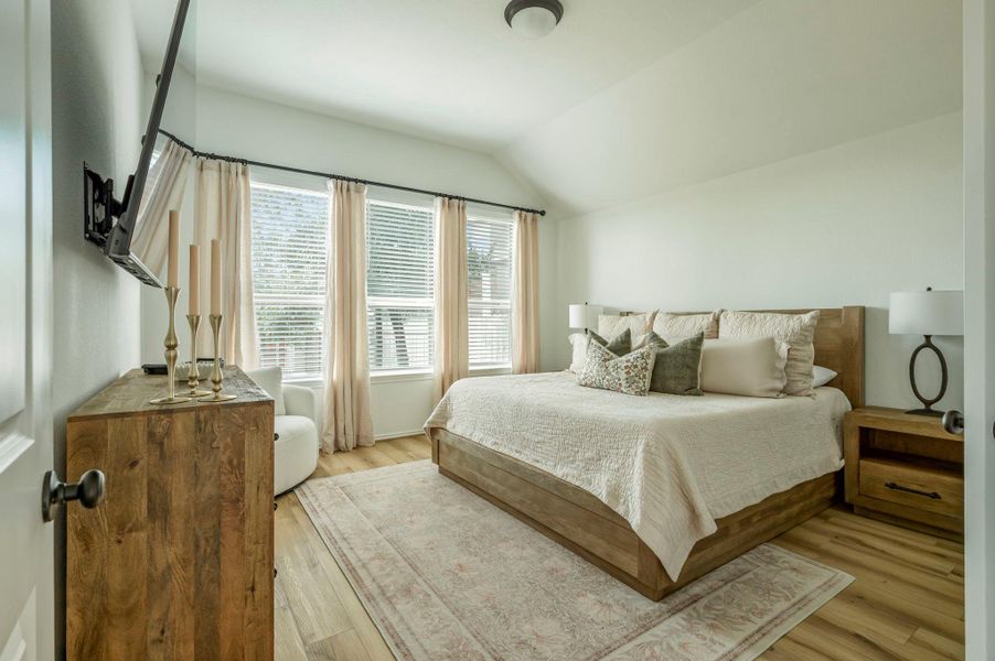 Primary Suite with Luxury Vinyl Floors & Windows with Views to the Backyard