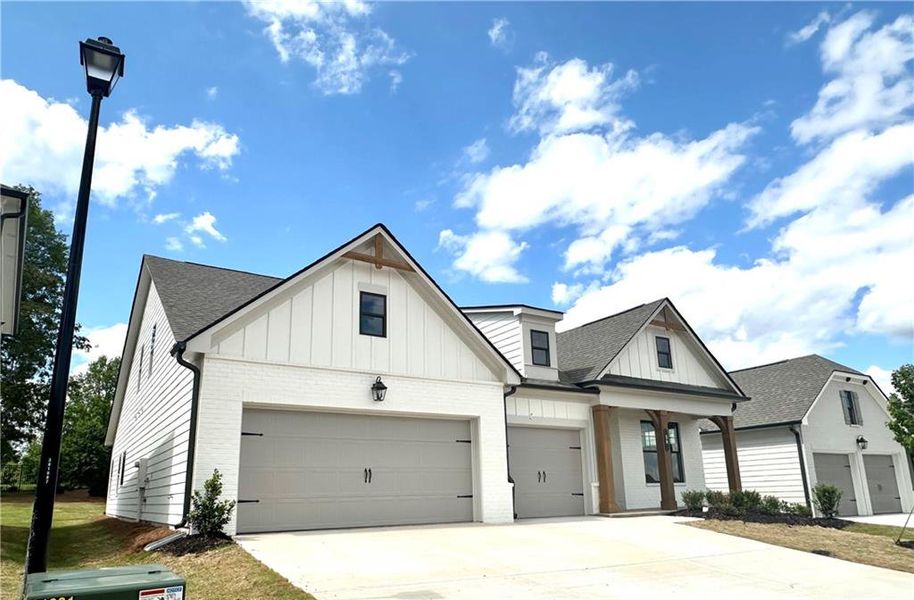 Front exterior of a new home in Summerlin, Winder, GA, highlighting curb appeal (Image 44).
