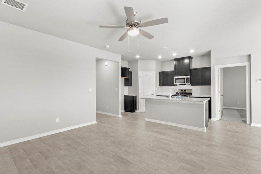Representative furnished interior of a home built from the Prickly Pear by View Homes in Campo Del Sol, El Paso (Image 8).