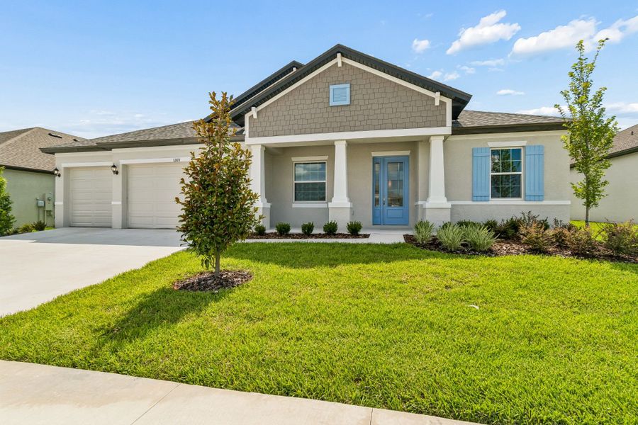 Front exterior of a new home in Pinecone Reserve, Brooksville, FL, highlighting curb appeal (Image 16). Front exterior of a new home in Pinecone Reserve, Brooksville, FL, highlighting curb appeal (Image 16).