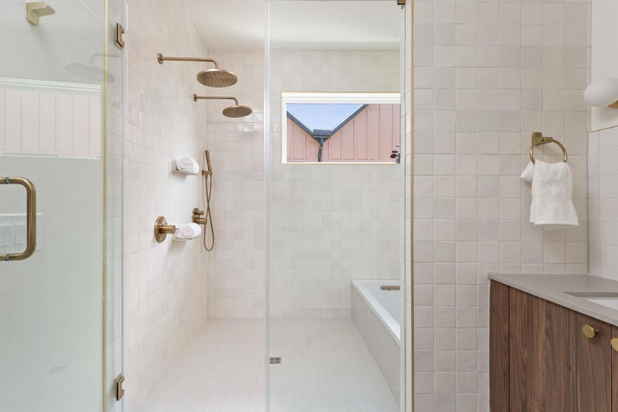Luxurious walk-in shower and separate soaking tub create a spa-like retreat. Luxurious walk-in shower and separate soaking tub create a spa-like retreat.