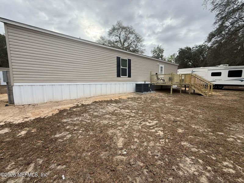 Exterior details and patio area of a home in , Florahome (Image 15).