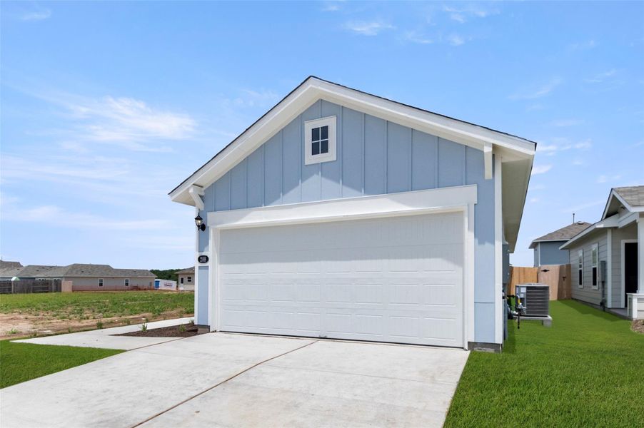 Garage with driveway Garage with driveway