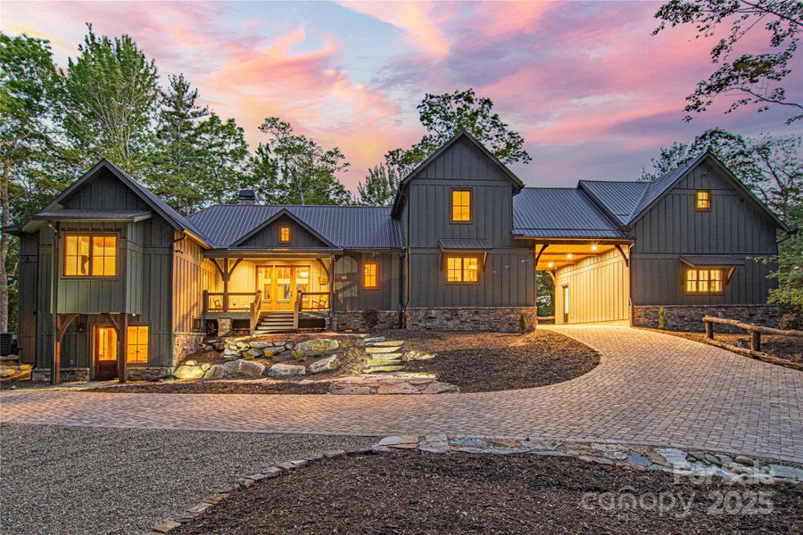 Front exterior of a new home in , Cashiers, NC, highlighting curb appeal (Image 1).