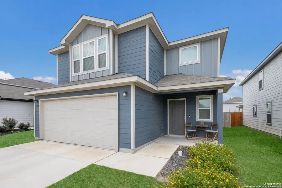 Front exterior of a new home in Winding Brook, San Antonio, TX, highlighting curb appeal (Image 1).