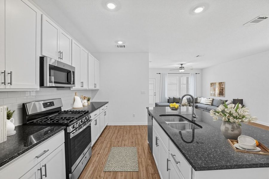 Furnished interior view inside a new home in Sunfield, Buda (Image 9).